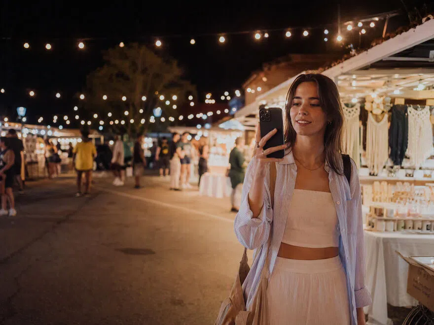 Night market lifestyle with smartphone