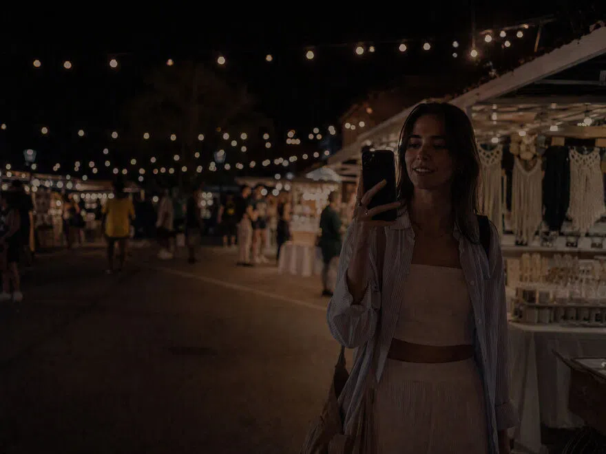 Night market lifestyle photo with smartphone